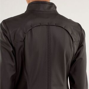 Lululemon Black Jacket with Geometric Sleeve Design Size 6/8 runs a bit big
